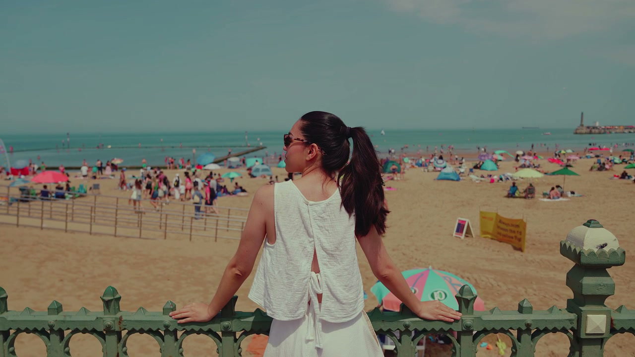 Woman Enjoying Margate Beach View from Pier