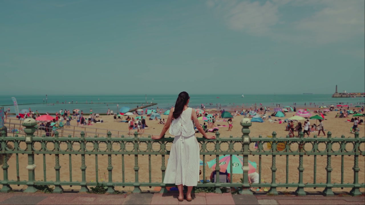Woman Overlooking Crowded Margate Beach