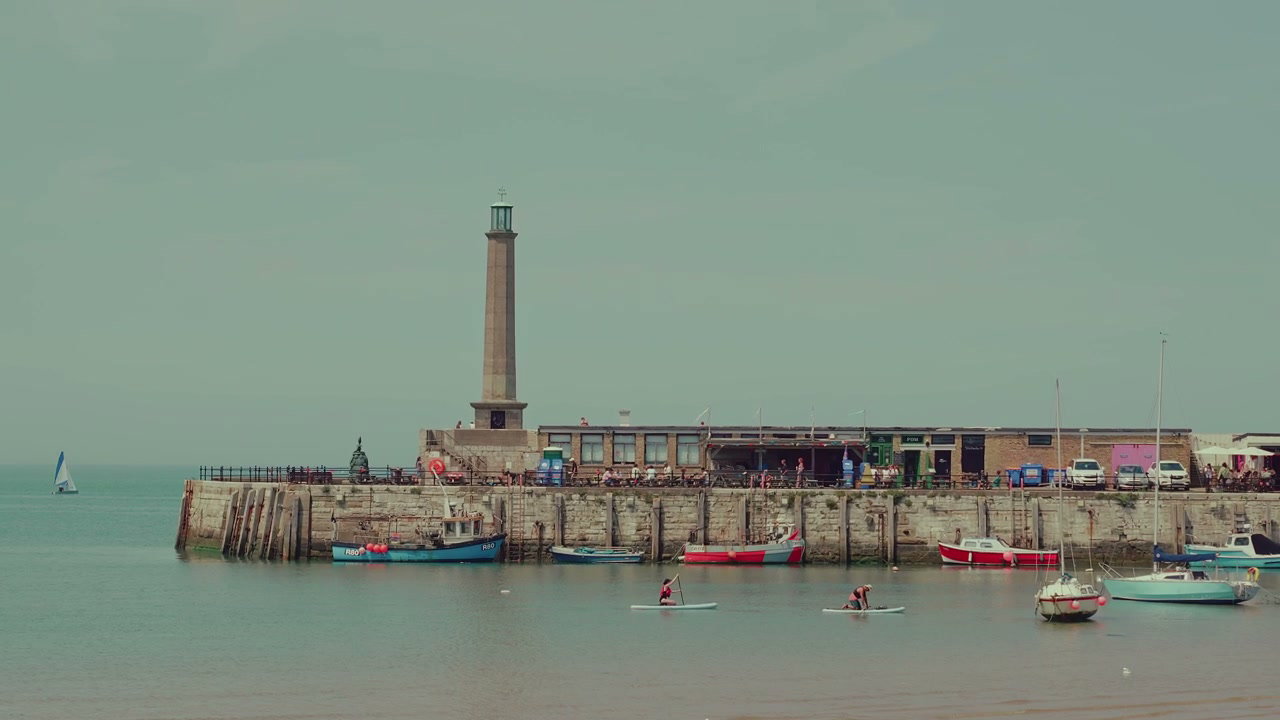 Margate Harbour with Lighthouse and Paddleboarders