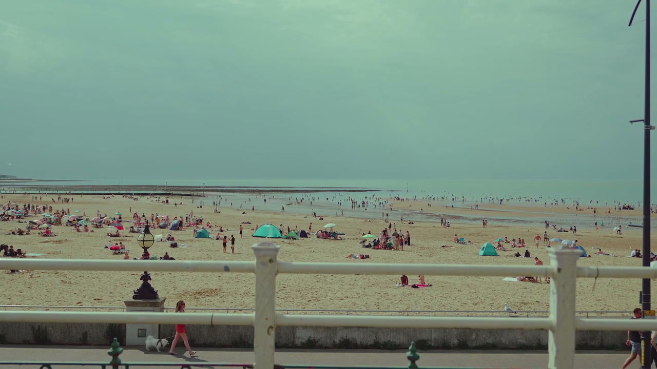 Busy Margate Beach with People and Promenade