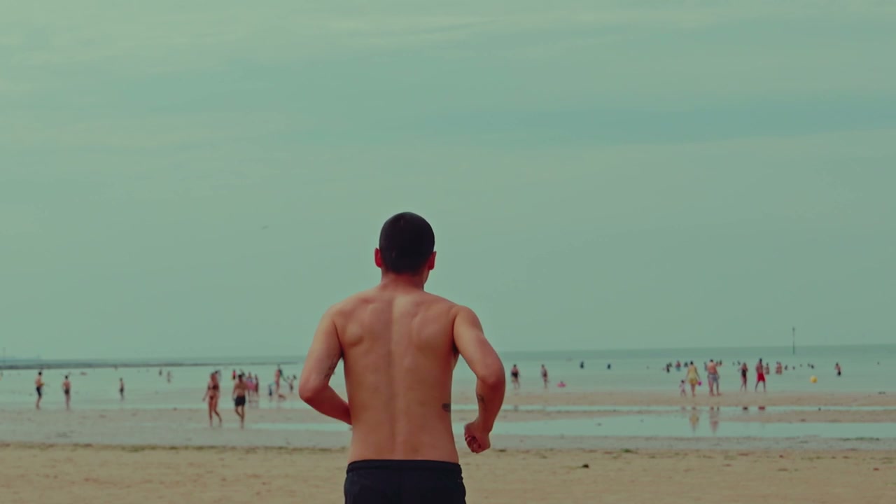 Man Waving on Margate Beach