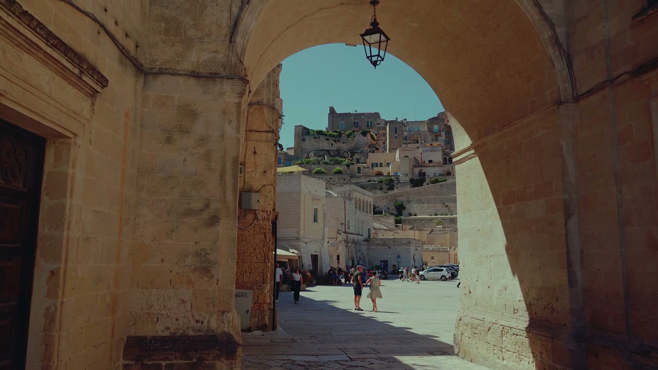 Matera Old Town through Stone Arch
