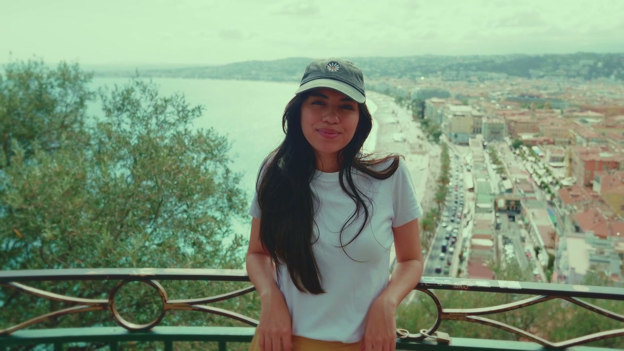Woman Smiling Over Nice Cityscape