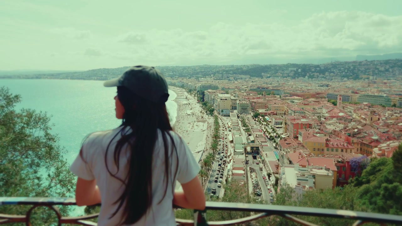 Person Overlooking Nice City and Coastline
