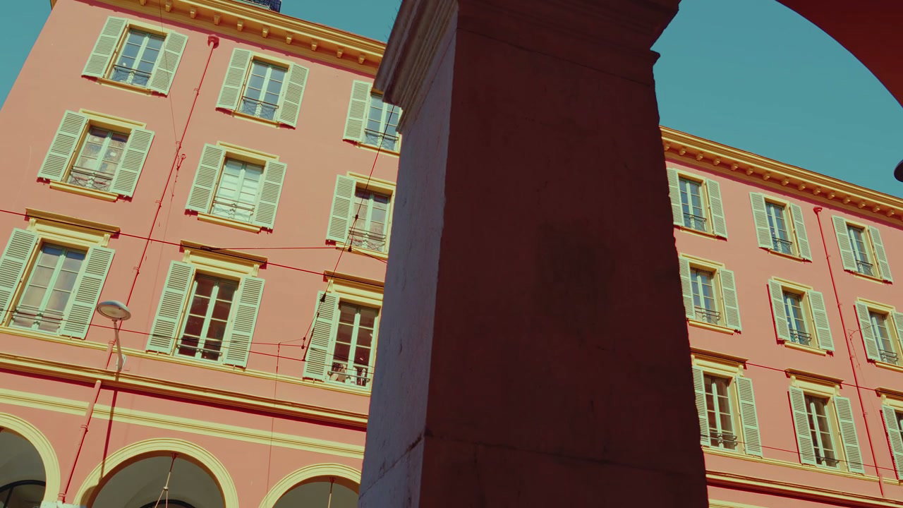 Historic Building with Shutters in Nice