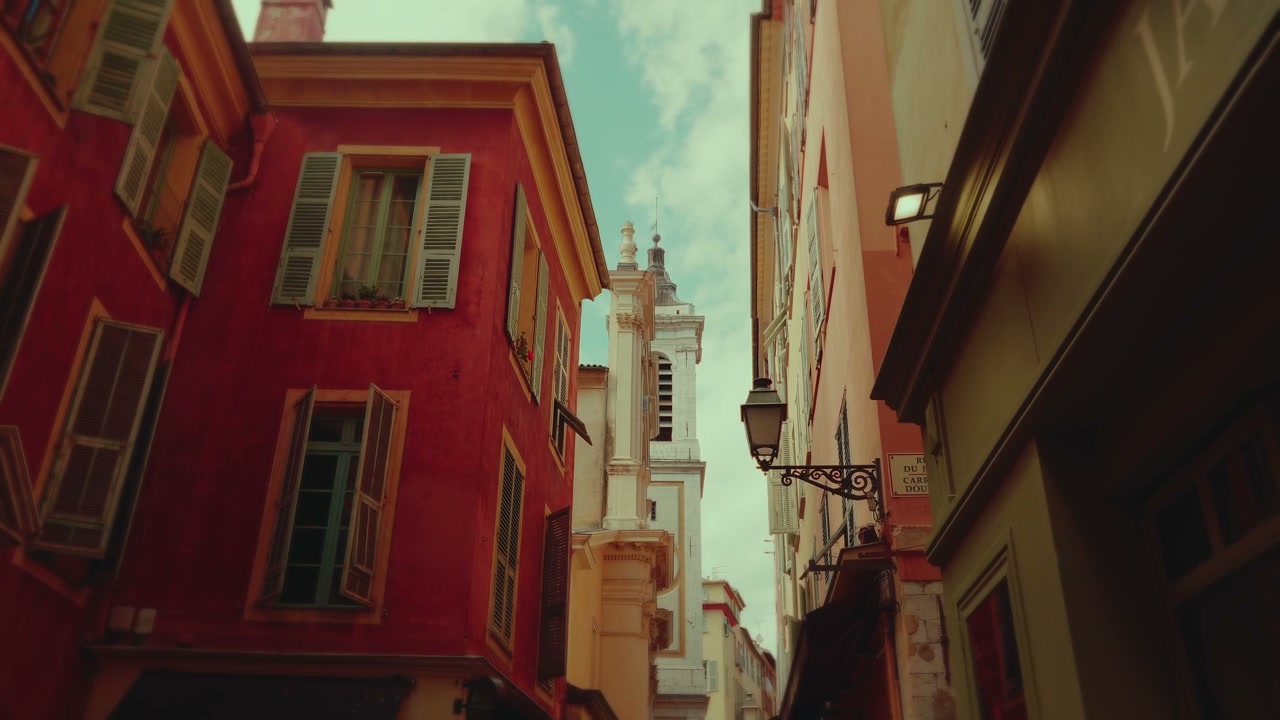 Colorful Street with Bell Tower in Nice