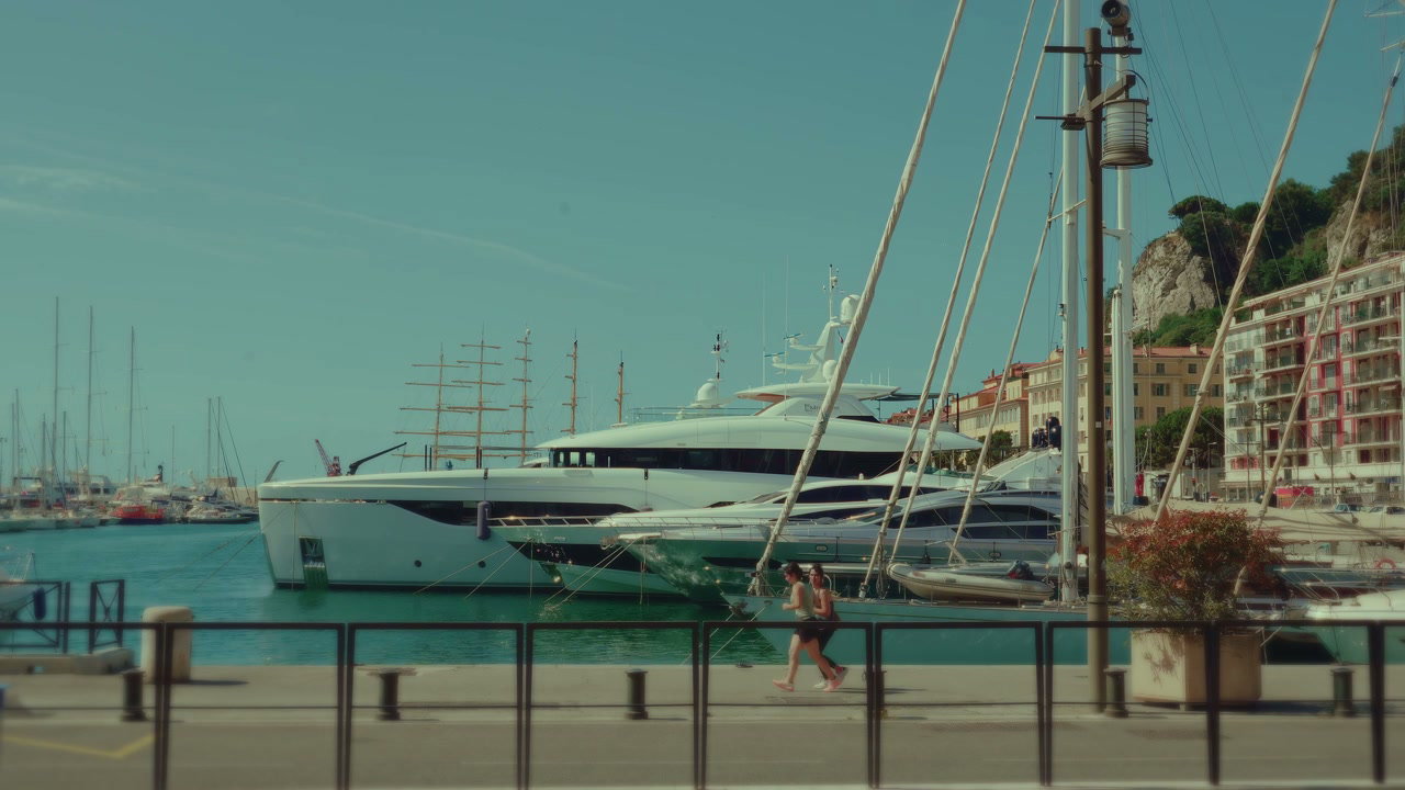 Yachts in Nice Harbor with People Walking