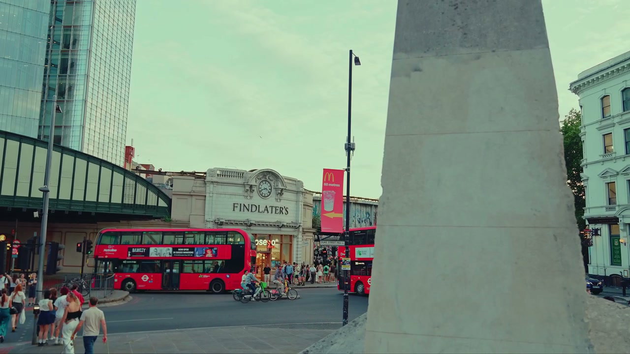 London Street with Buses and Pedestrians
