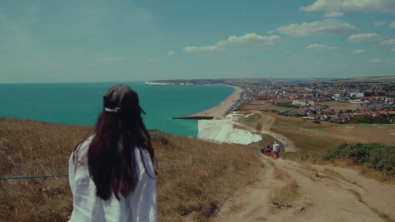 Person Walking Along Seven Sisters Cliffs