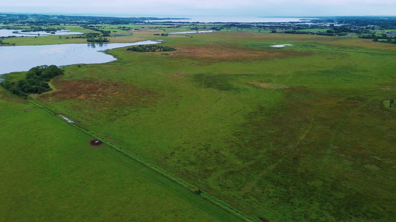 Aerial View Green Fields and Lake at Church Island