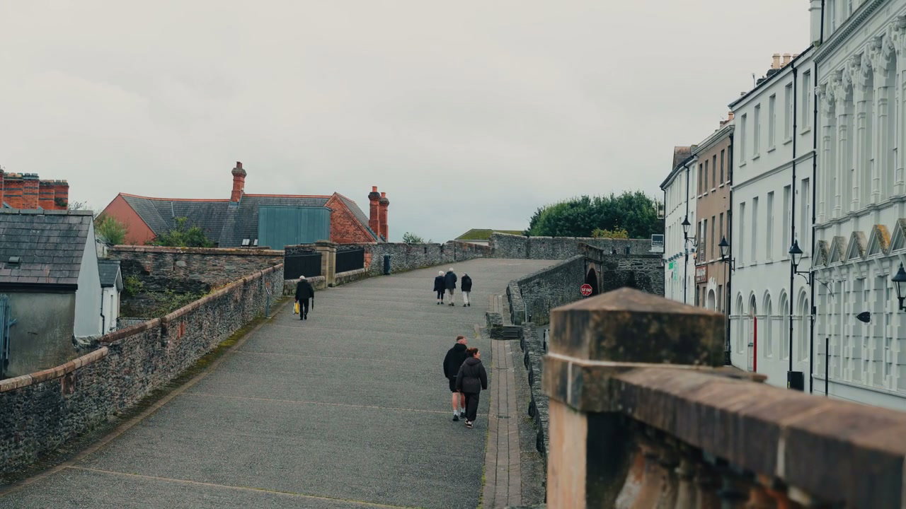 Pedestrians on Historic Derry City Walls