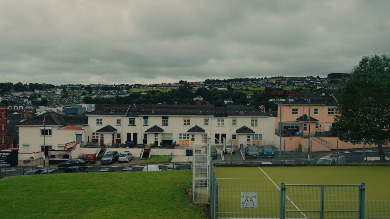 Row Houses and Cityscape in Derry on Cloudy Day