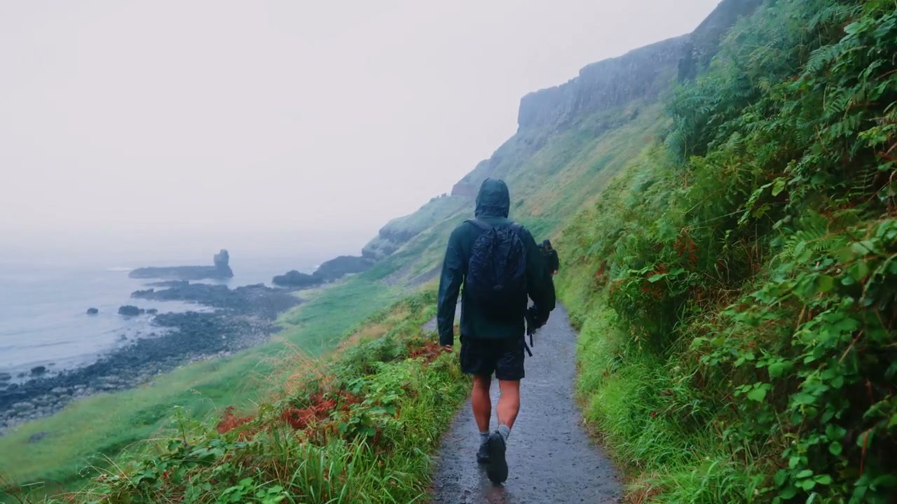 Hiker on Coastal Path at Giant's Causeway