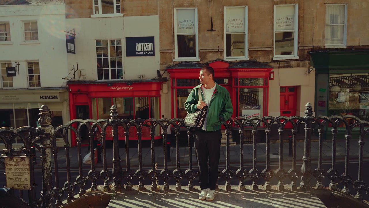 Man on Historic Bridge in Bath