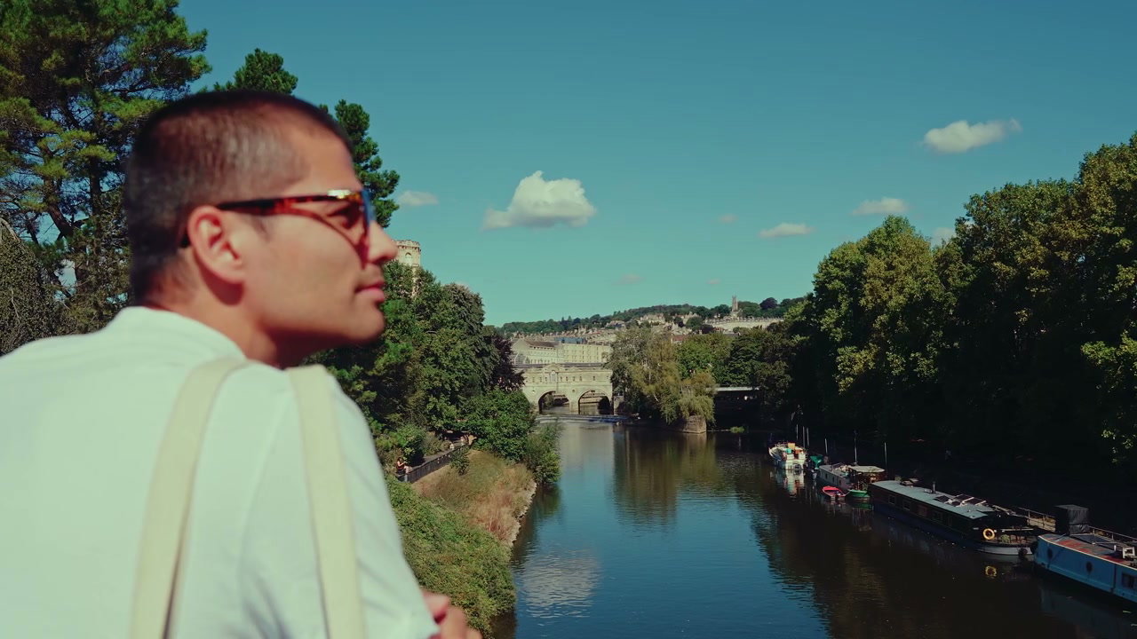 Person Looking at Pulteney Bridge in Bath