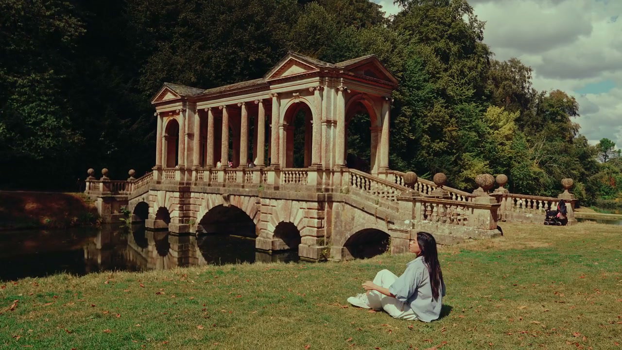 Person Relaxing by Palladian Bridge, Bath