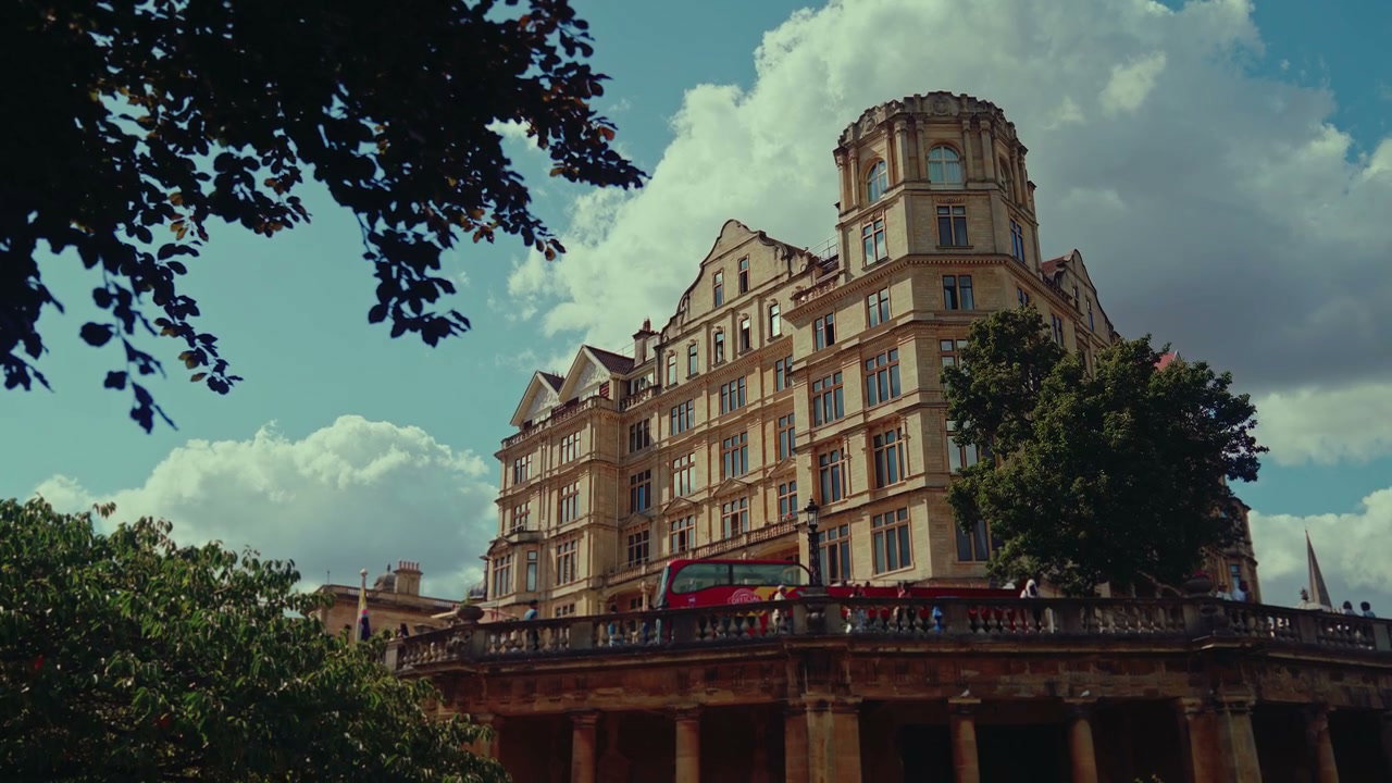 Historic Building And Tour Bus In Bath