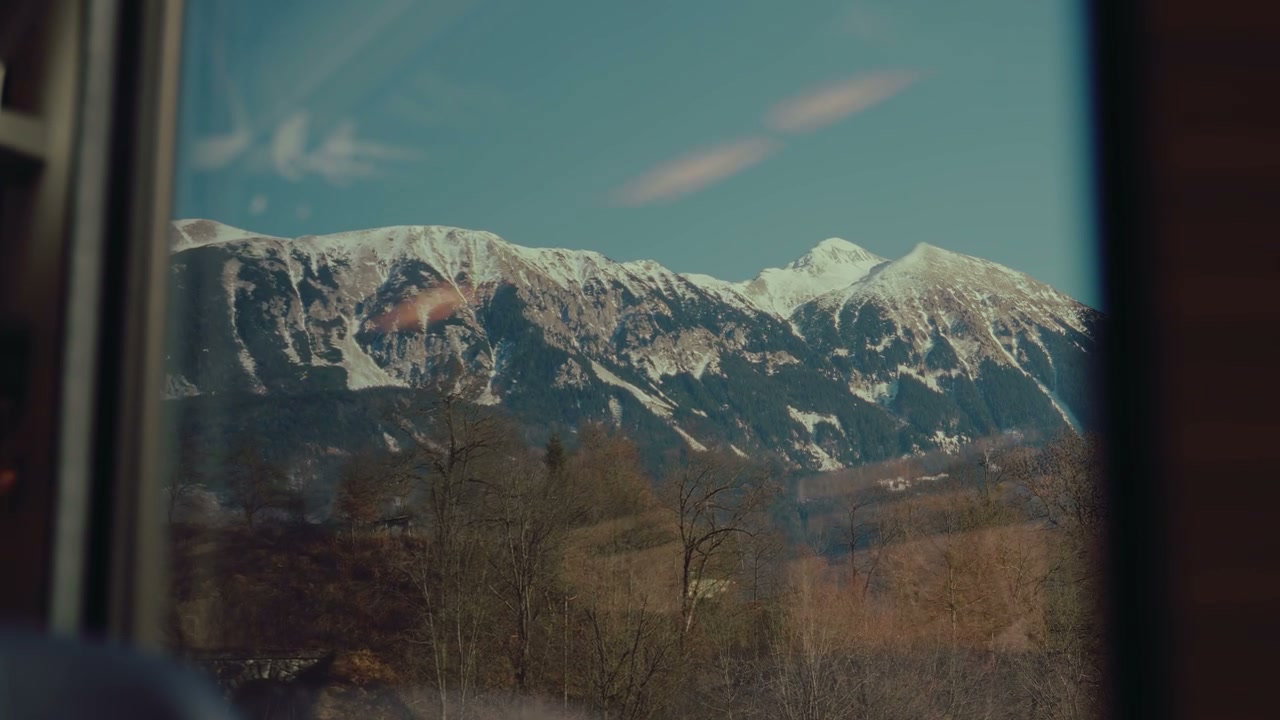 Snowy Mountains From Moving Train Window
