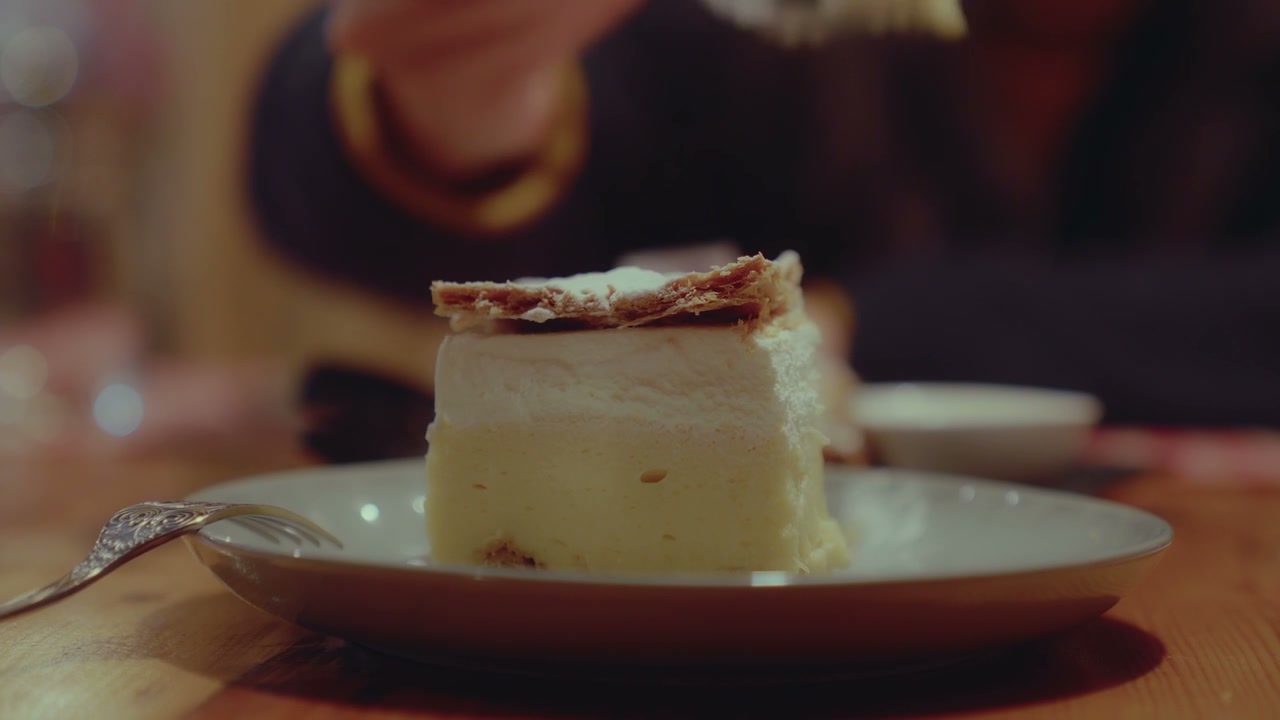 Bled Cream Cake Being Eaten