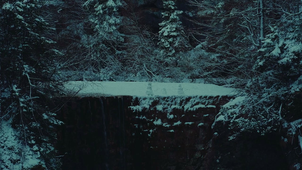 Snowy Waterfall and Snowmen in Forest