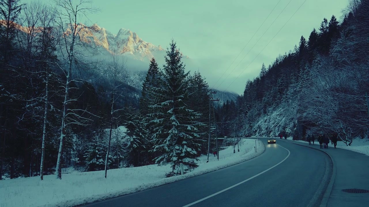Car Drives Winter Road Near Lake Jasna