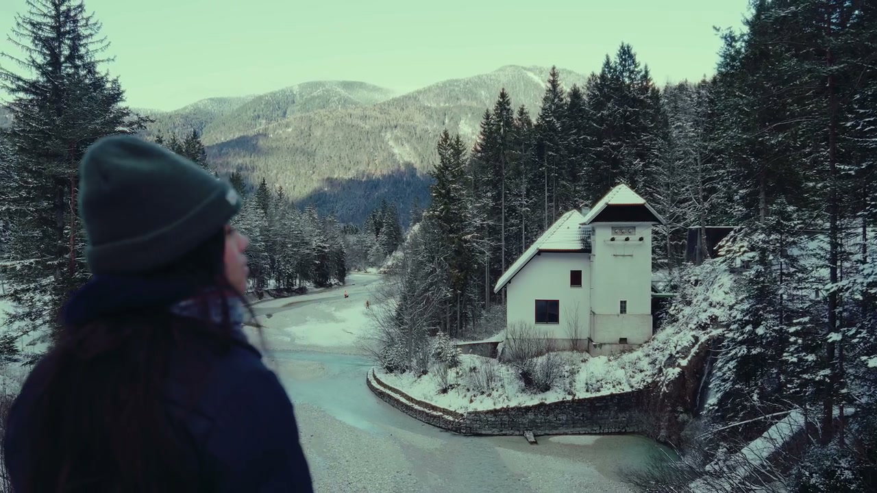 Person Looking at Snowy Lake Jasna Landscape