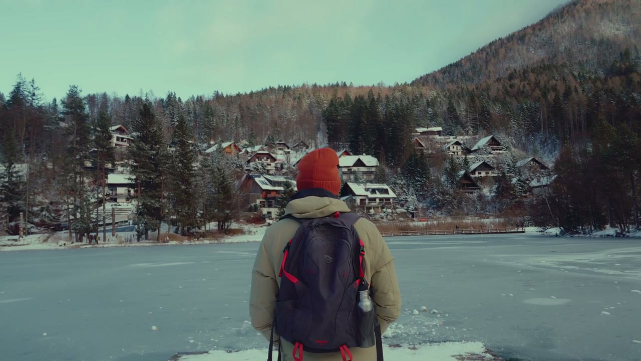 Hiker Explores Frozen Lake Jasna