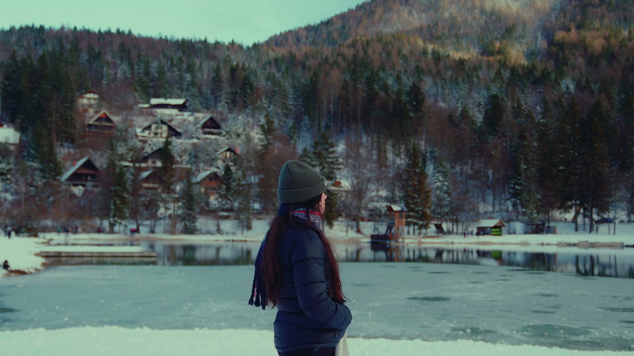 Woman Looking at Frozen Lake Jasna