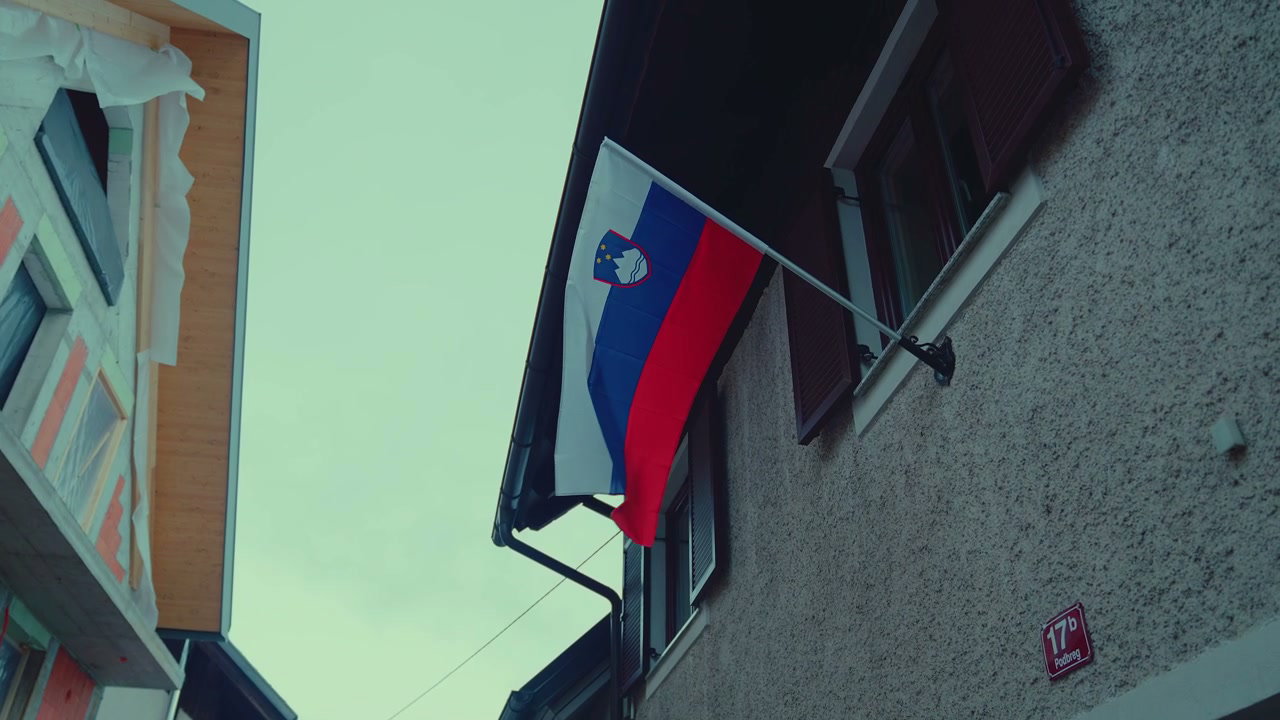 Slovenian Flag Waving on Building