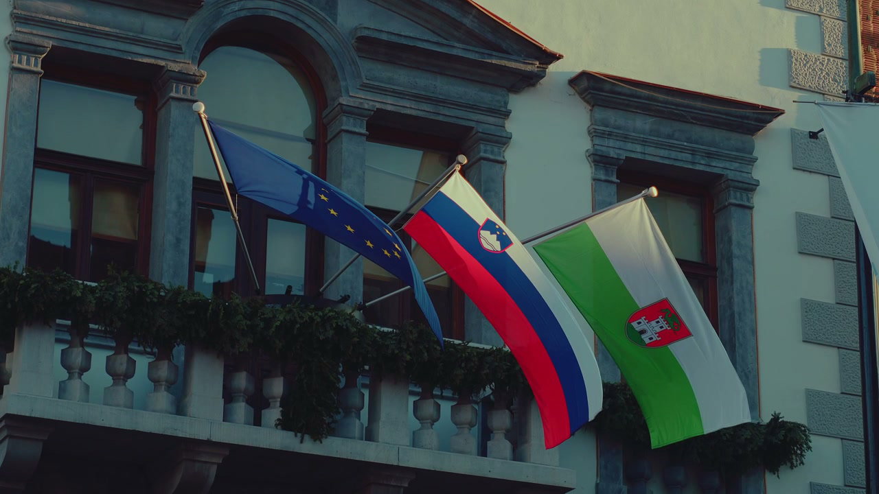 EU, Slovenia, and Ljubljana City Flags Waving