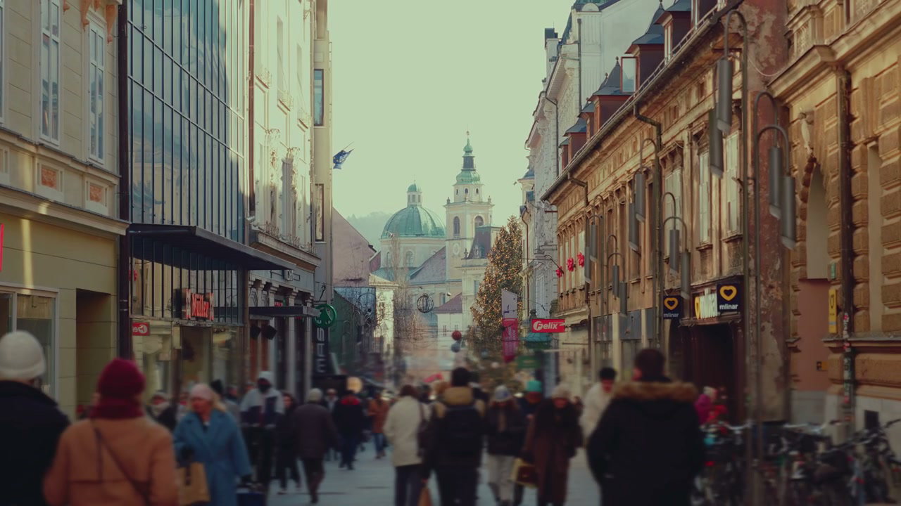 Busy City Street with Pedestrians in Ljubljana