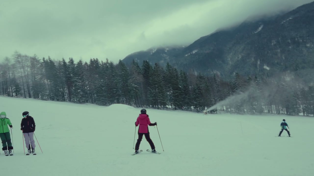 Skier On Snow-Covered Mountain Slope