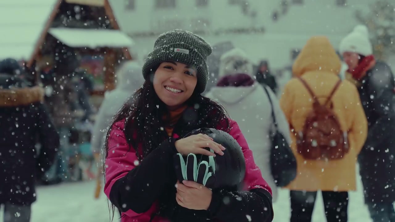Happy Woman in Winter Snow Holding Helmet