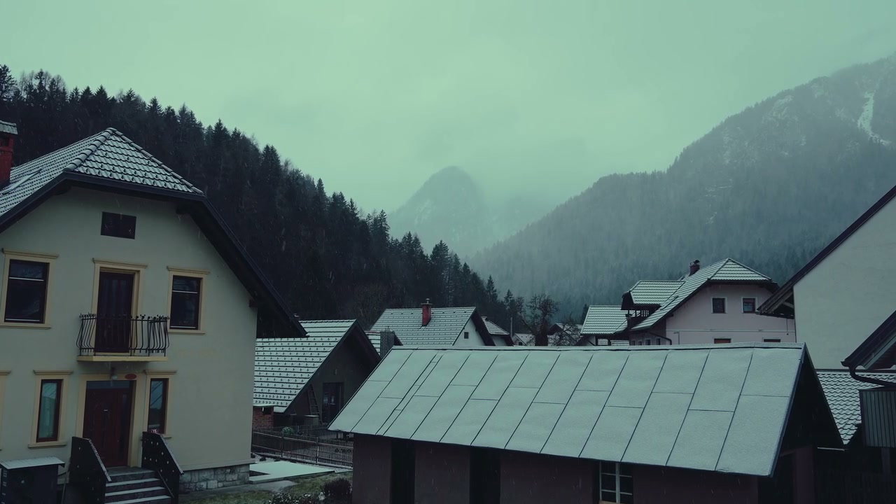 Winter Snow Falling on Mountain Village
