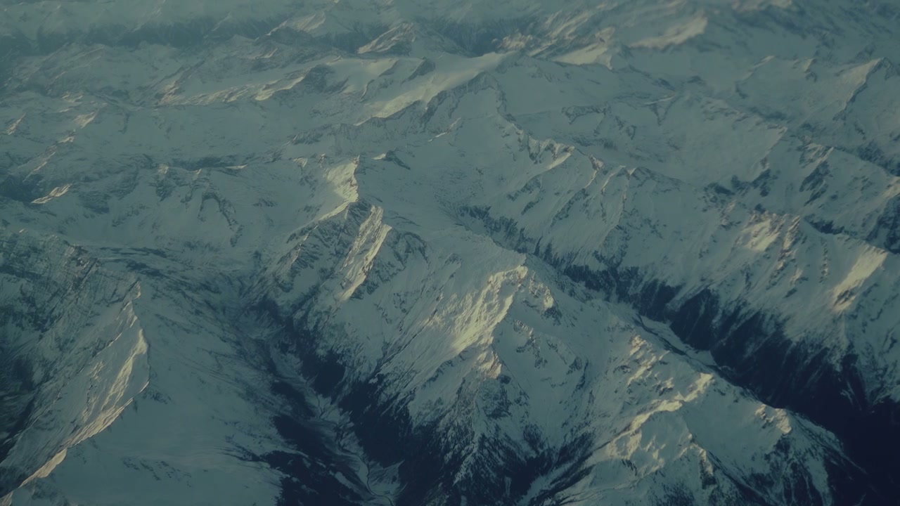 Aerial View Over Snow-Capped Mountains