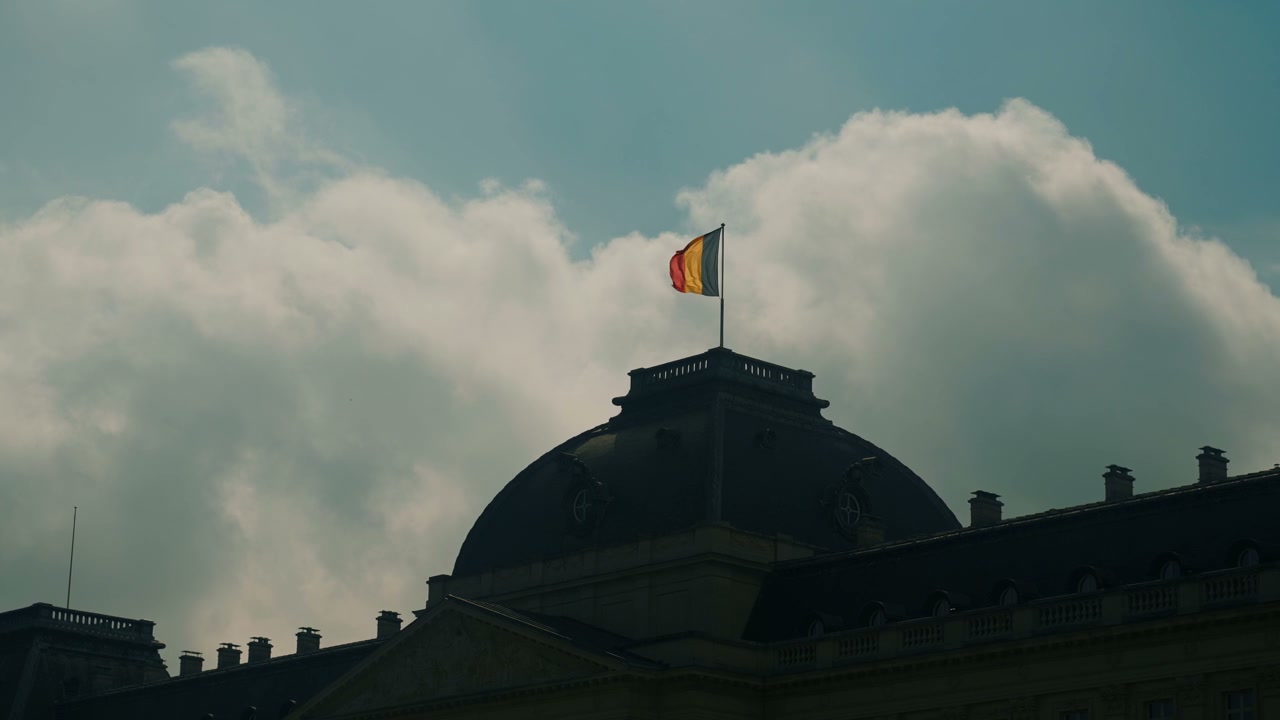 Belgian Flag Waving on Building in Brussels