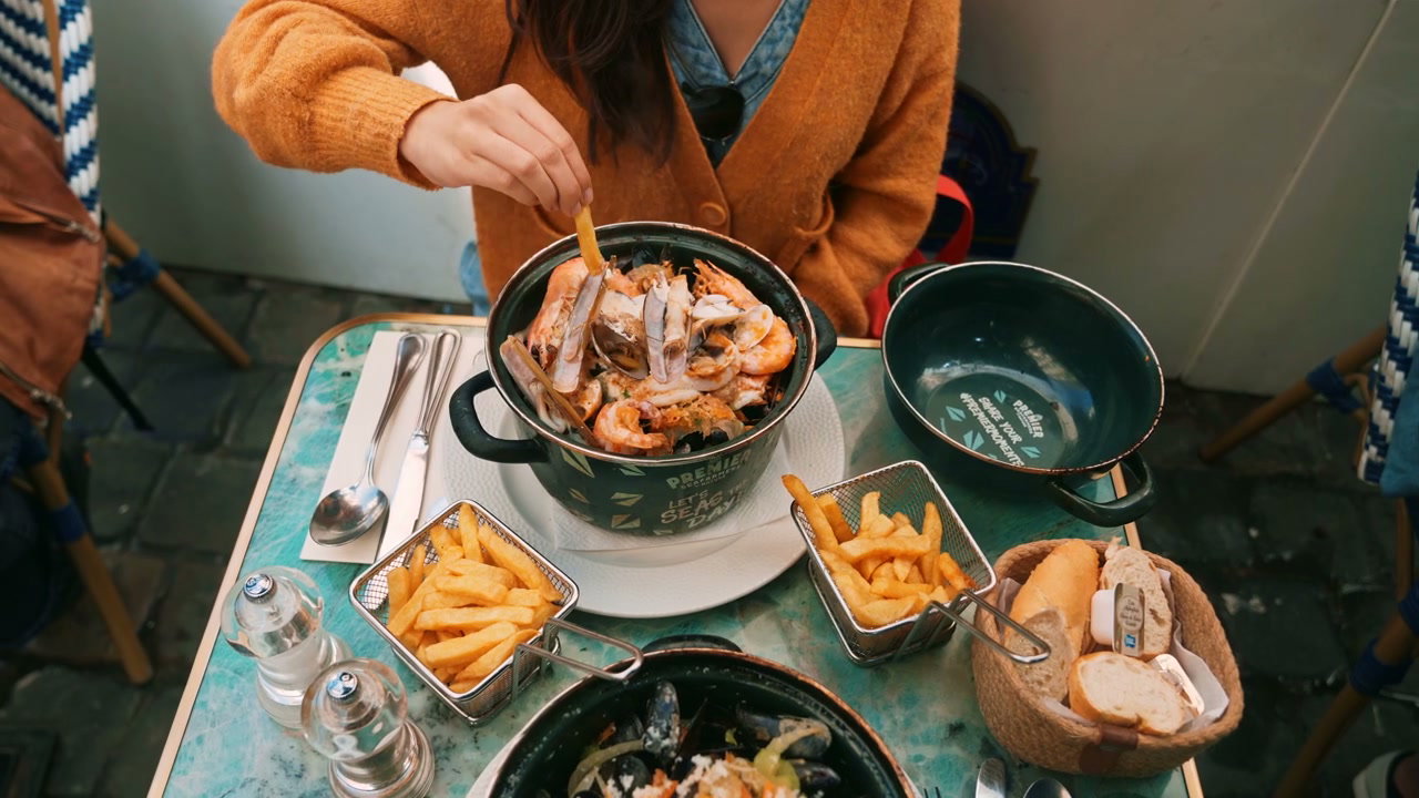 Eating Seafood and Fries at Outdoor Cafe in Brussels