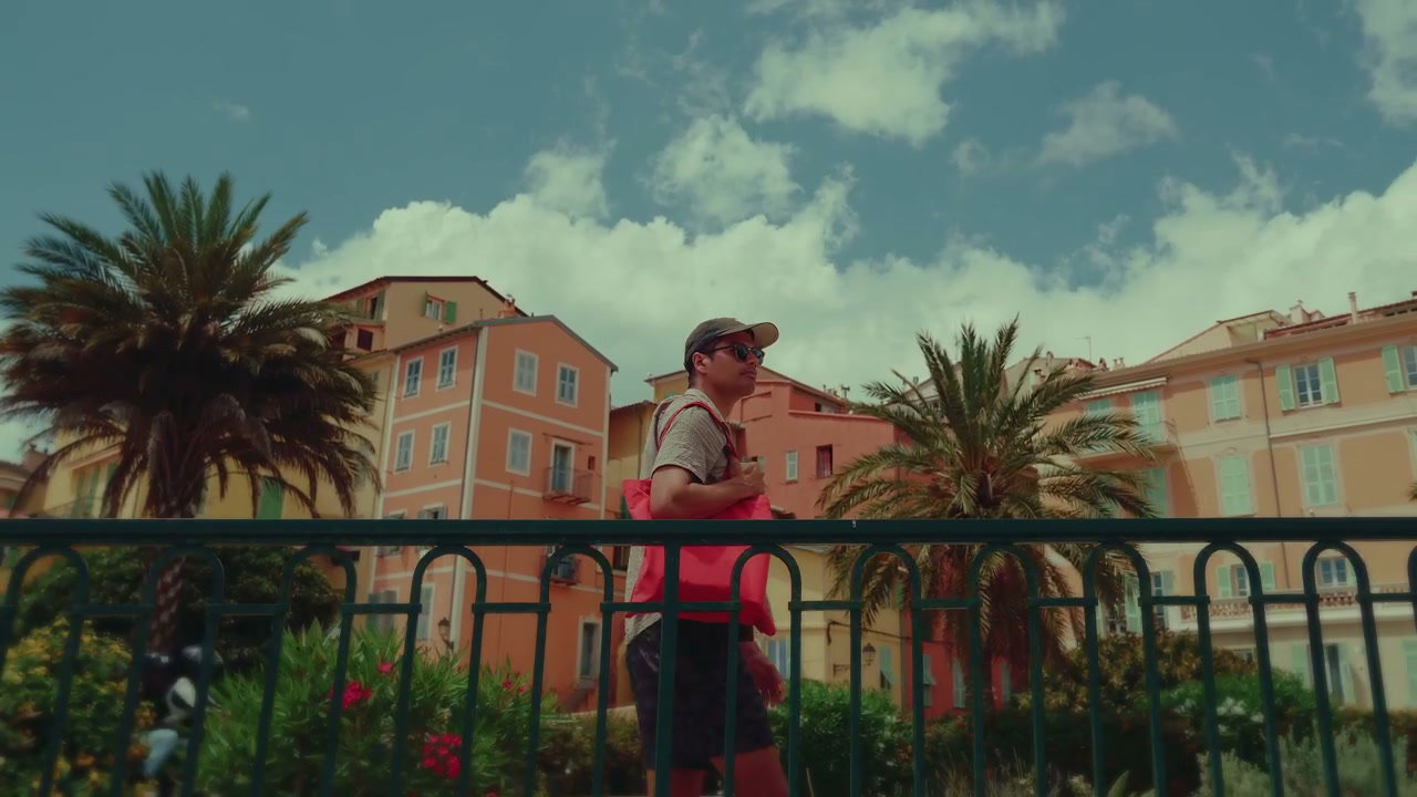 Tourist Walking Through Menton Town
