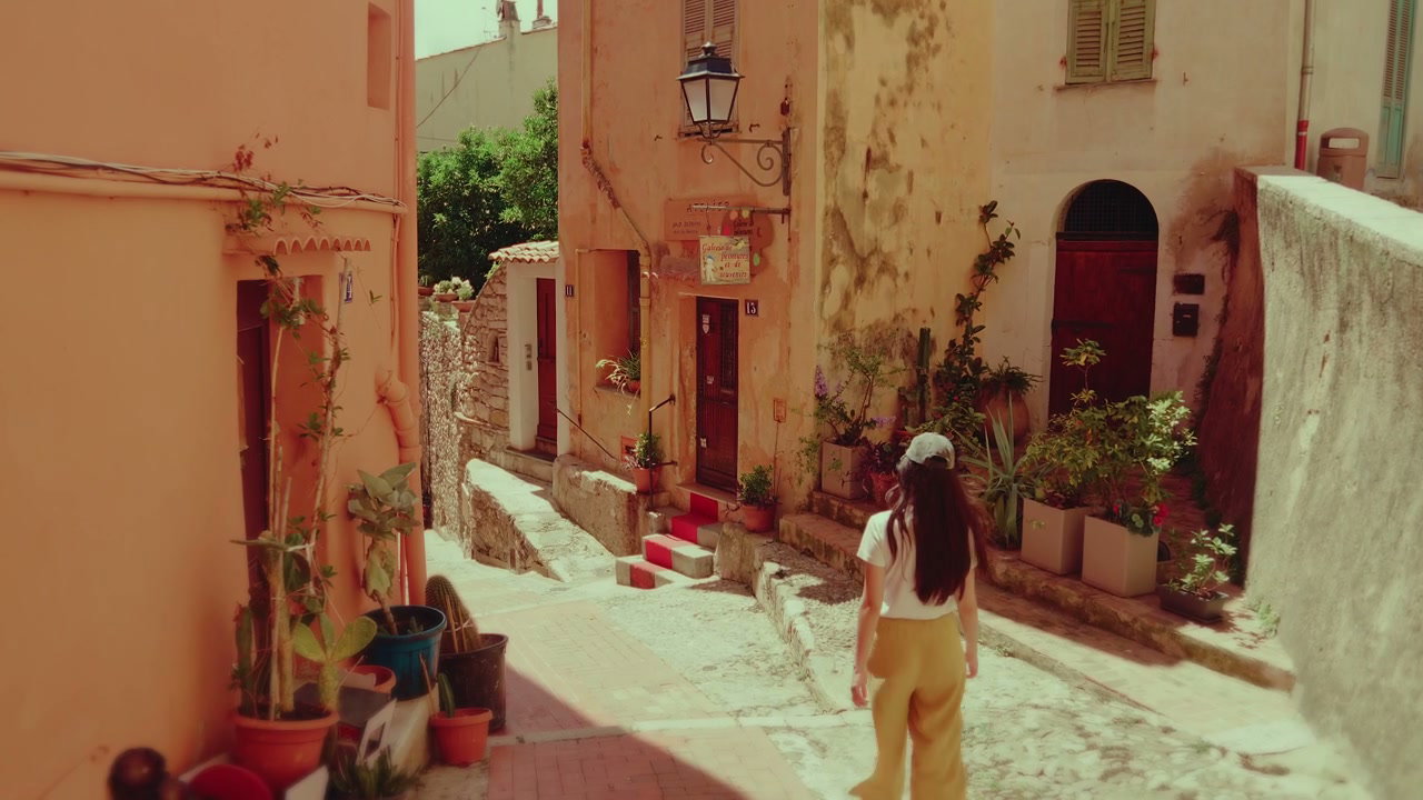 Person Walking Through Mediterranean Old Town
