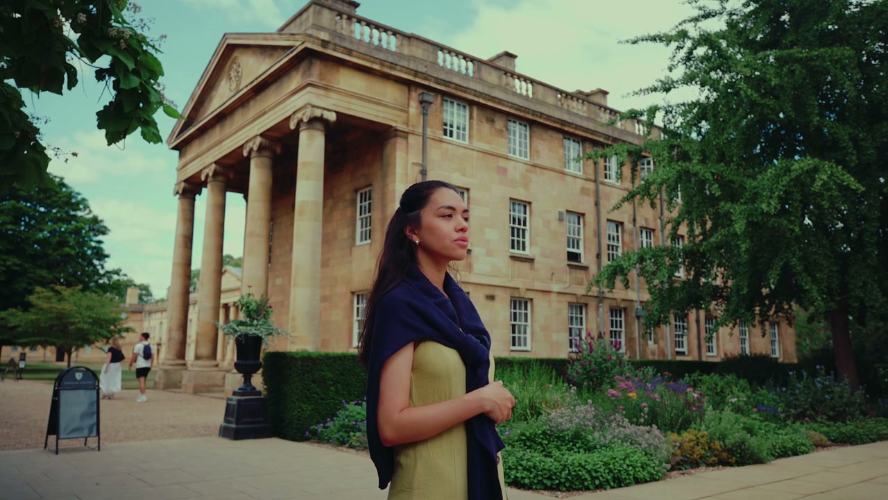 Contemplative Woman in Cambridge College