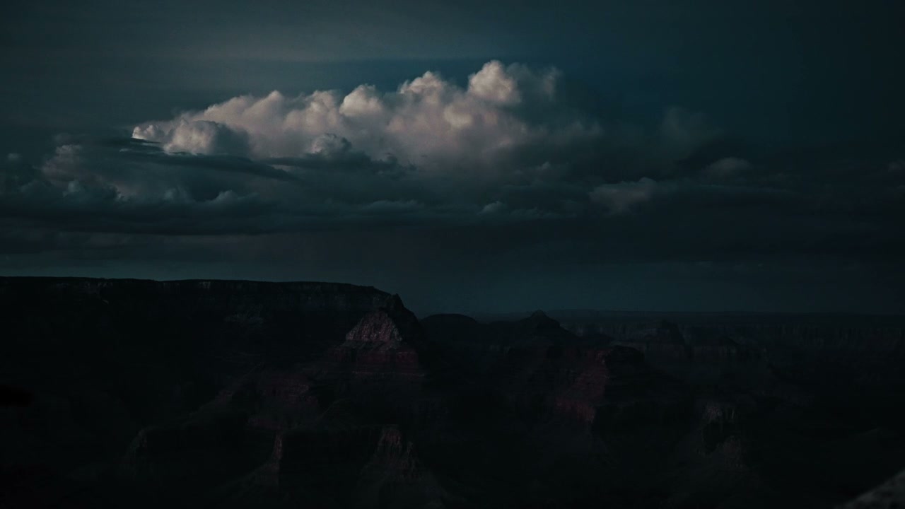 Dramatic Lightning Storm Over Canyon Landscape