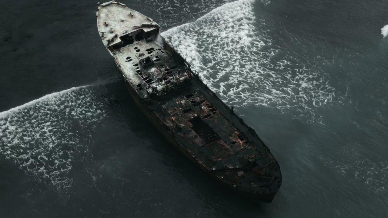 Aerial View of Shipwrecked Boat on Coast
