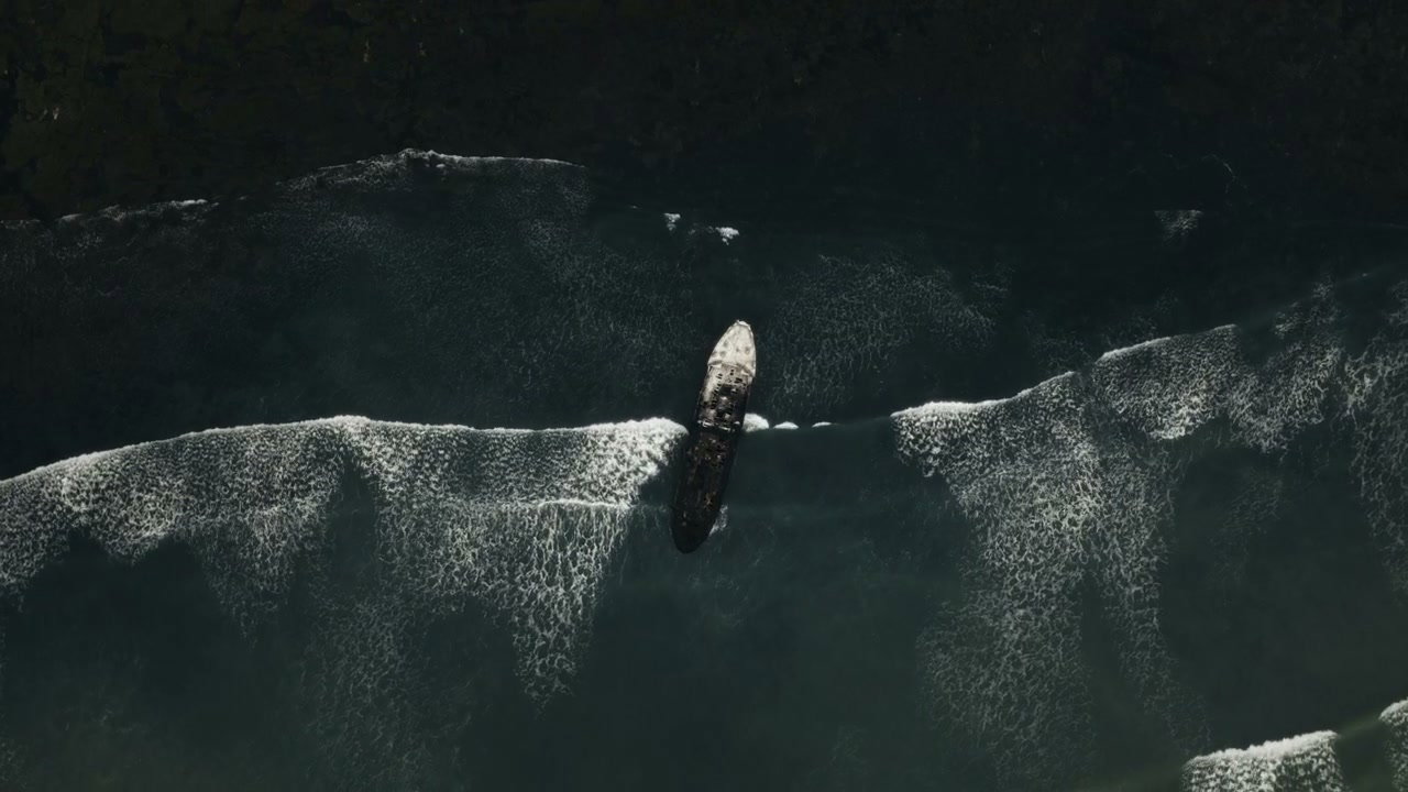 Shipwreck on Dark Coastline in Morocco