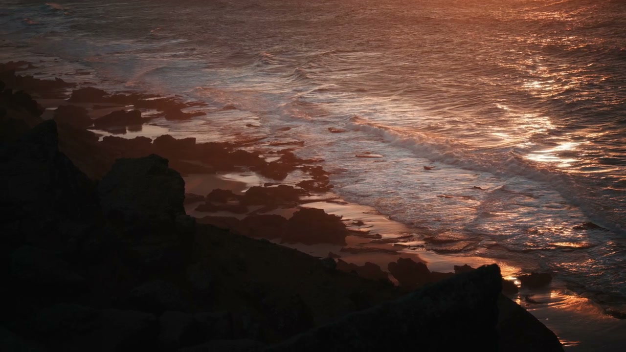 Sunset Waves on Rocky Coastline