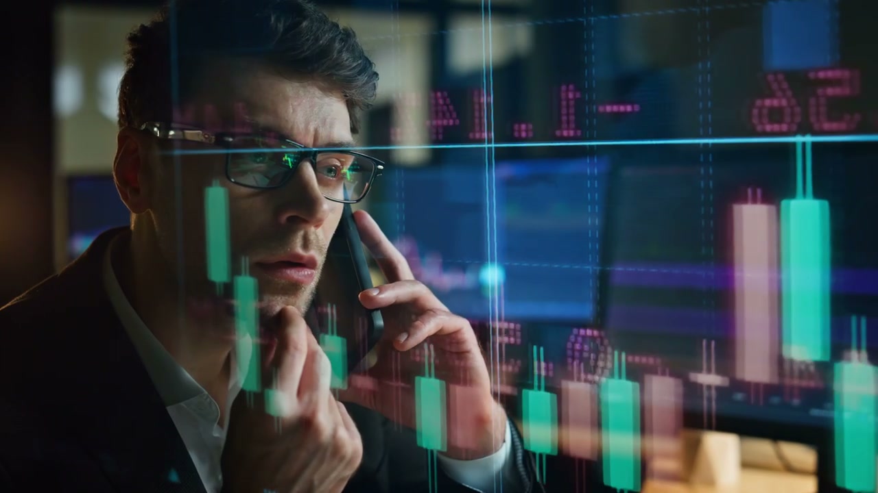 Focused Businessman Talking on Phone with Data Overlay