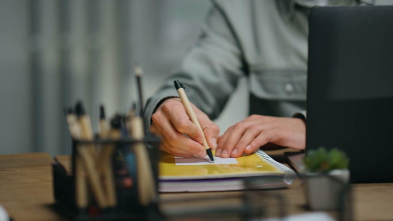 Man Writing and Throwing Paper Ball