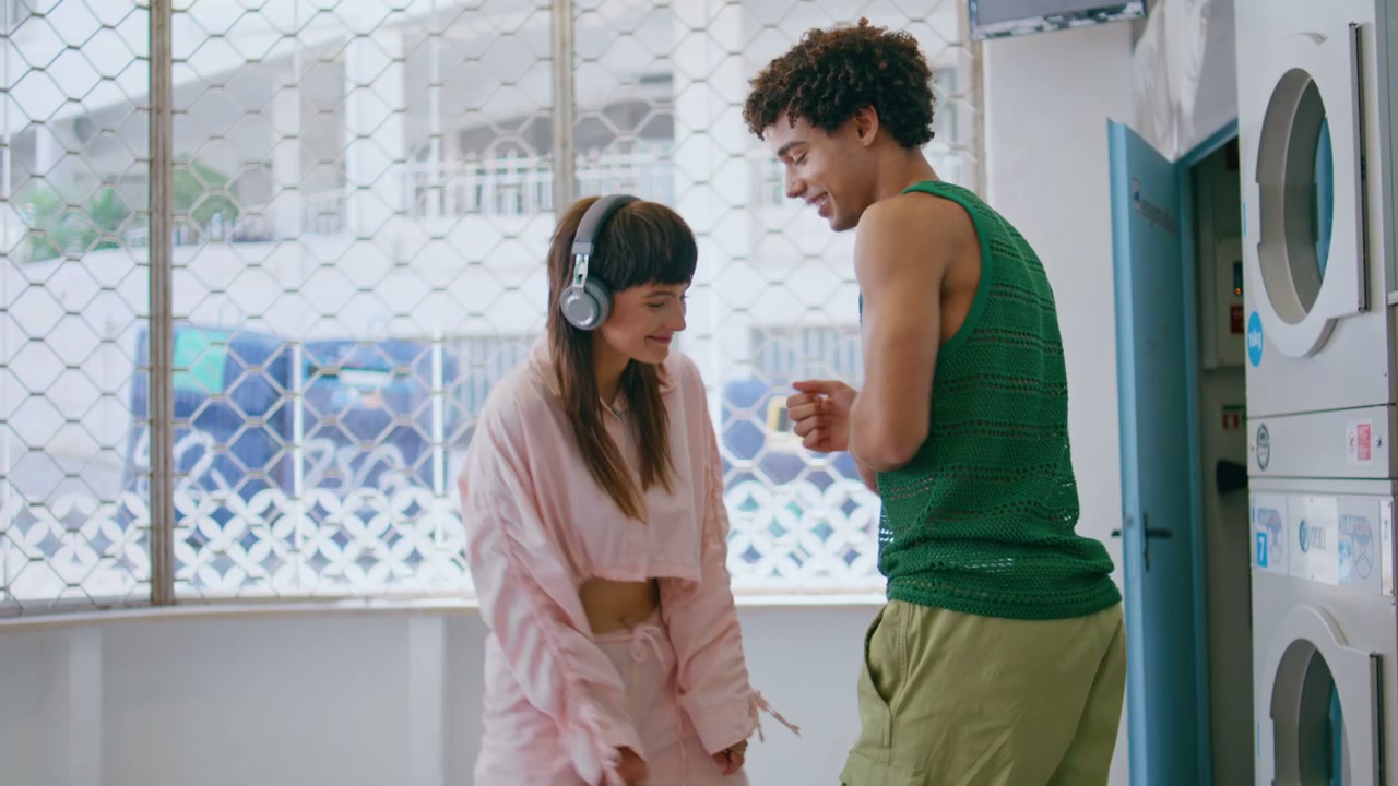 Couple Dancing in Laundromat