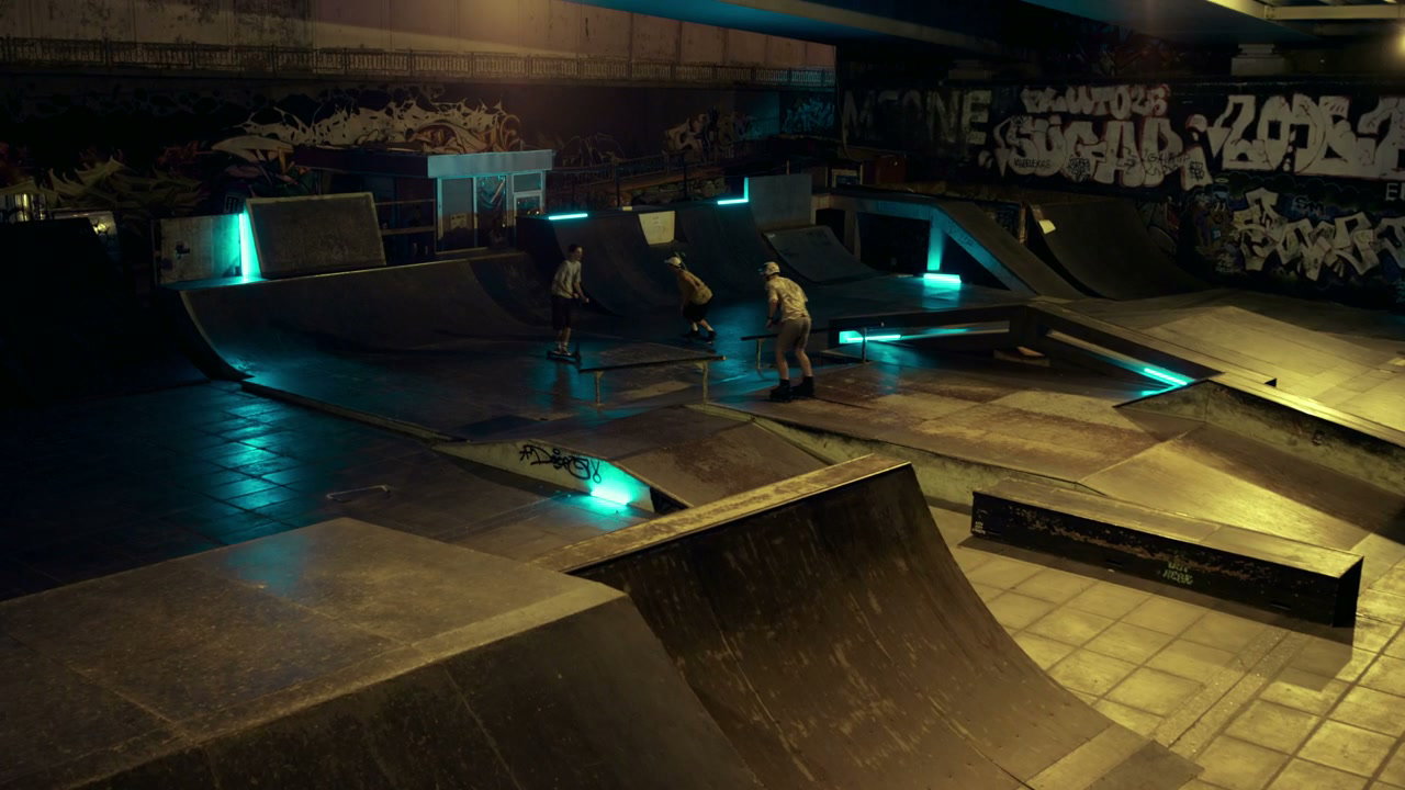 Skatepark At Night With Young Athletes