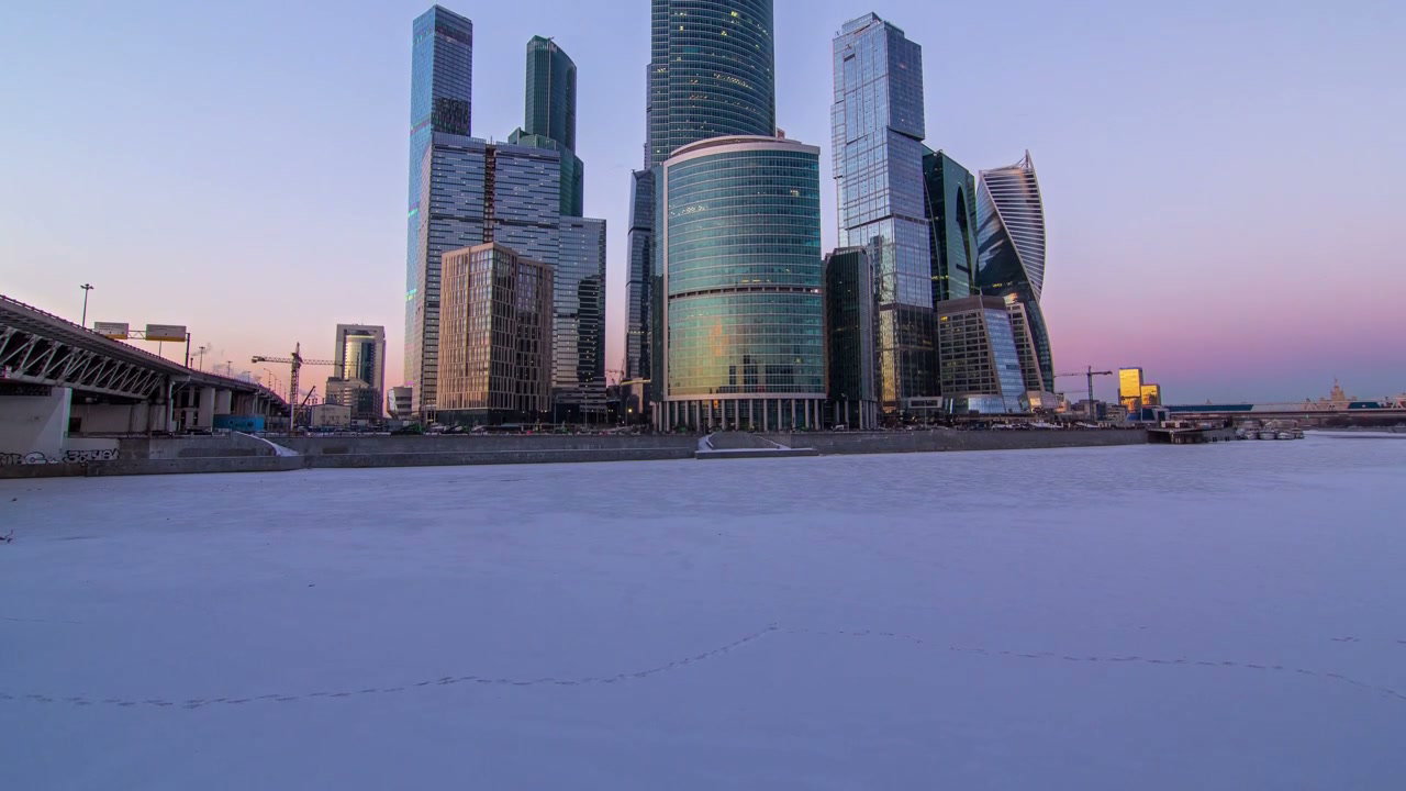 Moscow City Skyscrapers at Twilight Over Frozen River