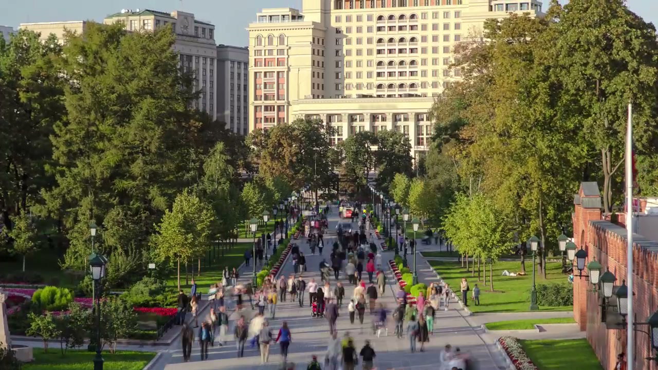 People Walking in Moscow Park with Motion Blur
